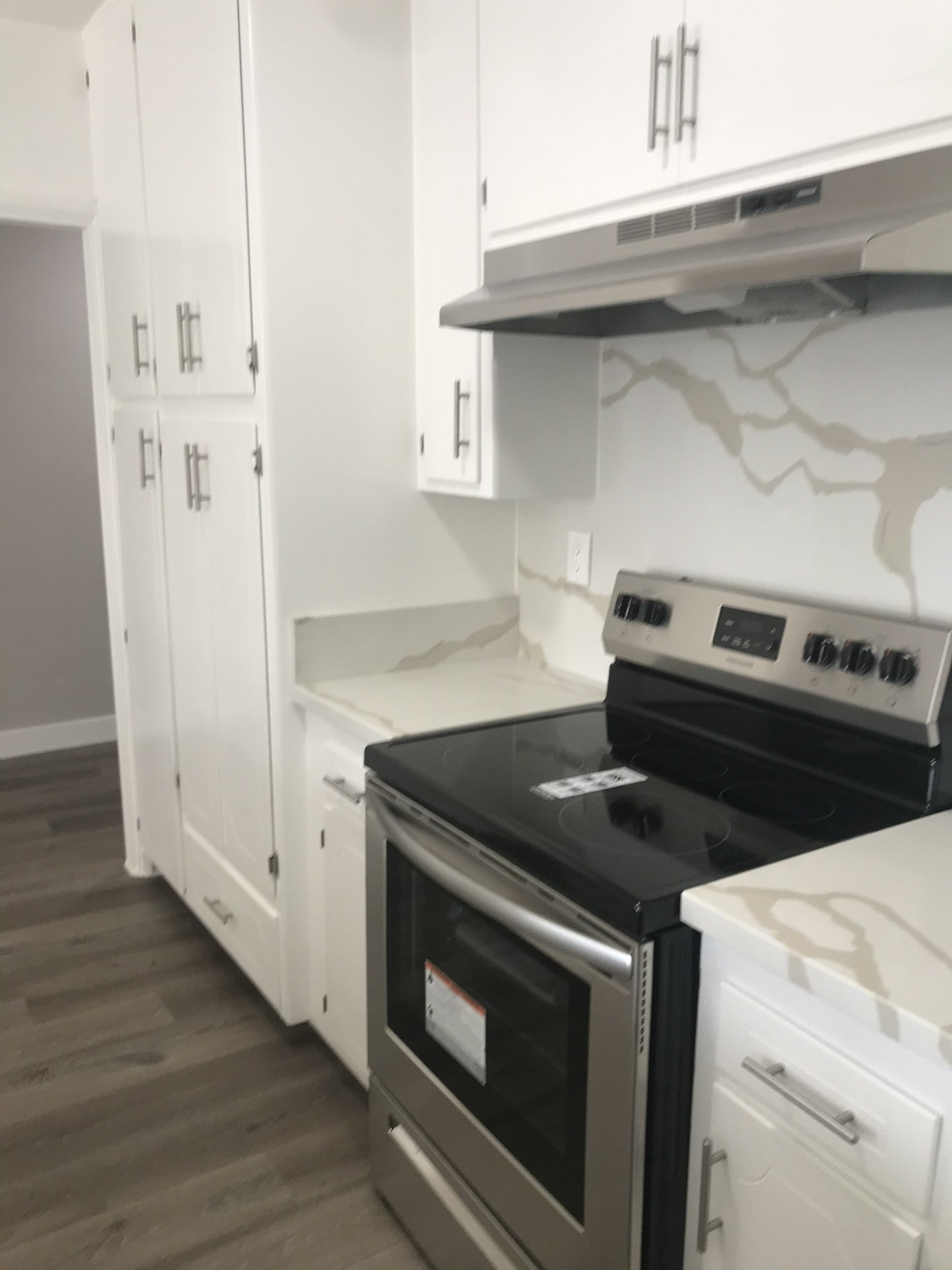 Kitchen with a stainless range, original unaltered photo